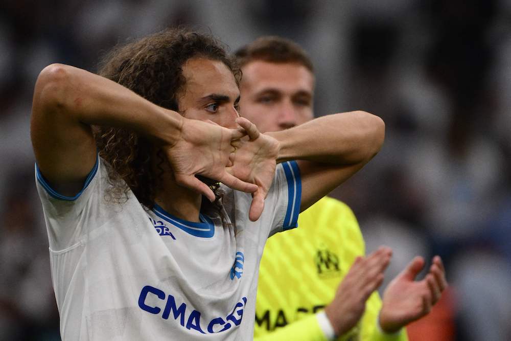 Marseille midfielder #06 Matteo Guendouzi reacts at the end of the UEFA Champions League second leg of the third qualifying round football match between Olympique Marseille (OM) and Panathinaikos at the Velodrome stadium in Marseille, on August 15, 2023. (Photo by CHRISTOPHE SIMON/AFP via Getty Images)