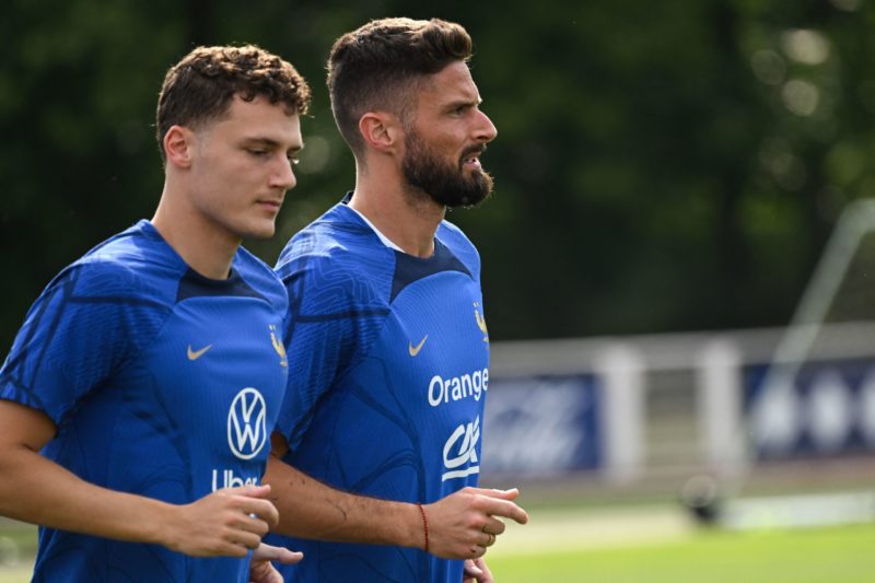 France's defender Benjamin Pavard (L) and France's forward Olivier Giroud during a training session ahead of the upcoming UEFA Euro 2024 football tournament qualifying matches, in Clairefontaine-en-Yvelines on June 10, 2023. France will play against Gibraltar on June 16, 2023 and against Greece on June 19, 2023 in their UEFA Euro 2024 Group B Qualification matches. (Photo by Bertrand GUAY / AFP) (Photo by BERTRAND GUAY/AFP via Getty Images)