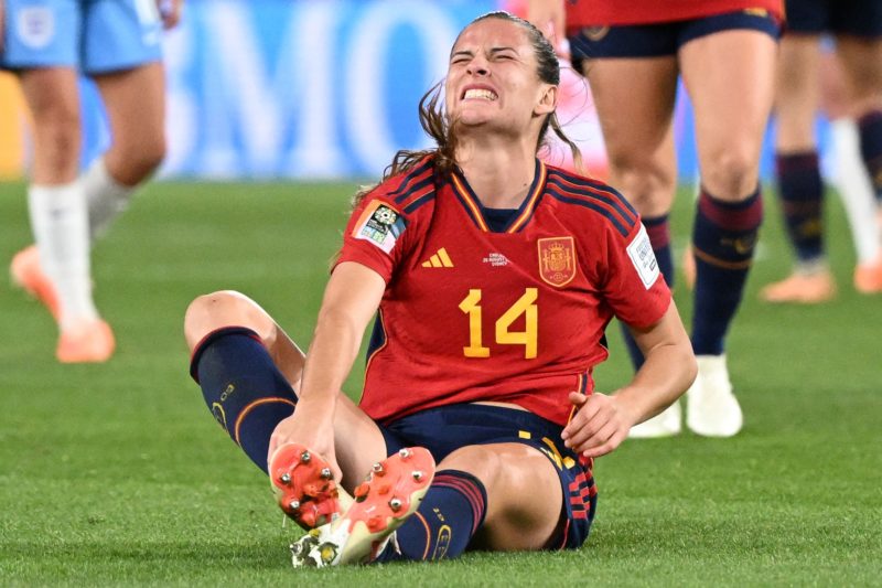 Spain's defender #14 Laia Codina reacts after picking up an injury during the Australia and New Zealand 2023 Women's World Cup final football match between Spain and England at Stadium Australia in Sydney on August 20, 2023. (Photo by WILLIAM WEST / AFP) (Photo by WILLIAM WEST/AFP via Getty Images)