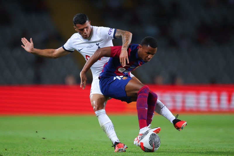 BARCELONA, SPAIN - AUGUST 08: Ansu Fati of FC Barcelona is tackled by Pedro Porro of Tottenham Hotspurduring the Joan Gamper Trophy match between FC Barcelona and Tottenham Hotspur at Estadi Olimpic Lluis Companys on August 08, 2023 in Barcelona, Spain. (Photo by Eric Alonso/Getty Images)