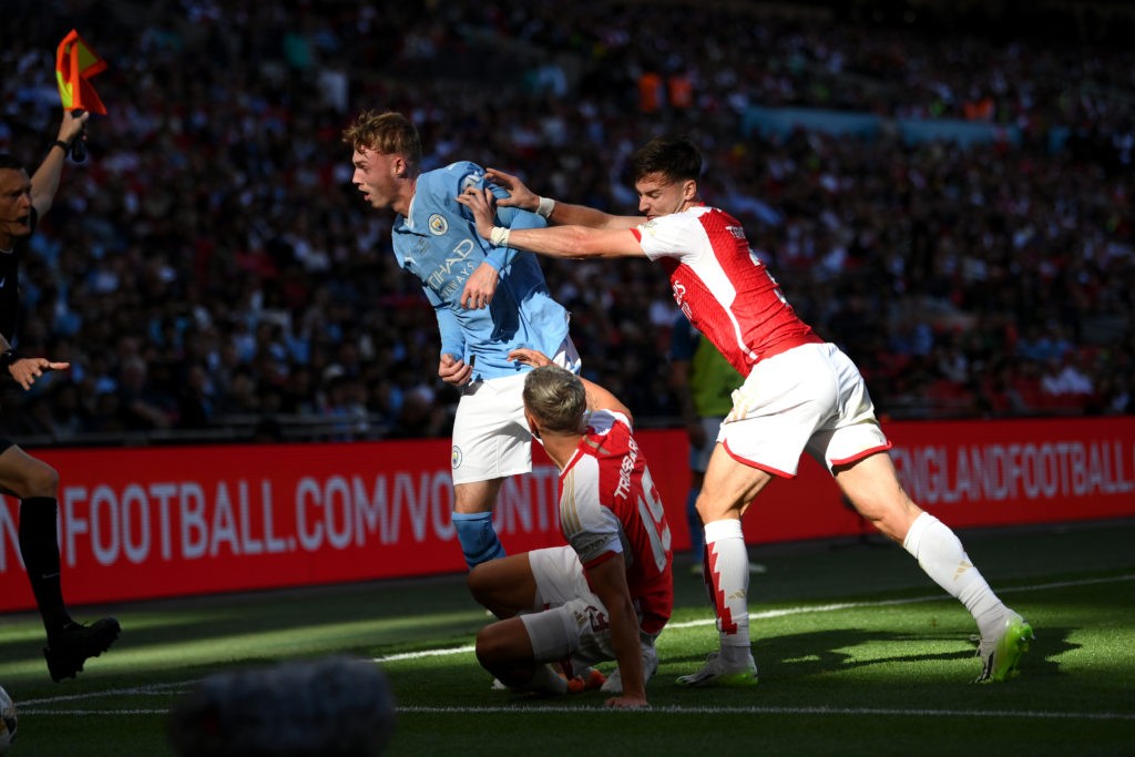 LONDON, ENGLAND - AUGUST 06: Kieran Tierney of Arsenal pushes Cole Palmer of Manchester City during The FA Community Shield match between Manchester City against Arsenal at Wembley Stadium on August 06, 2023 in London, England. (Photo by Mike Hewitt/Getty Images)