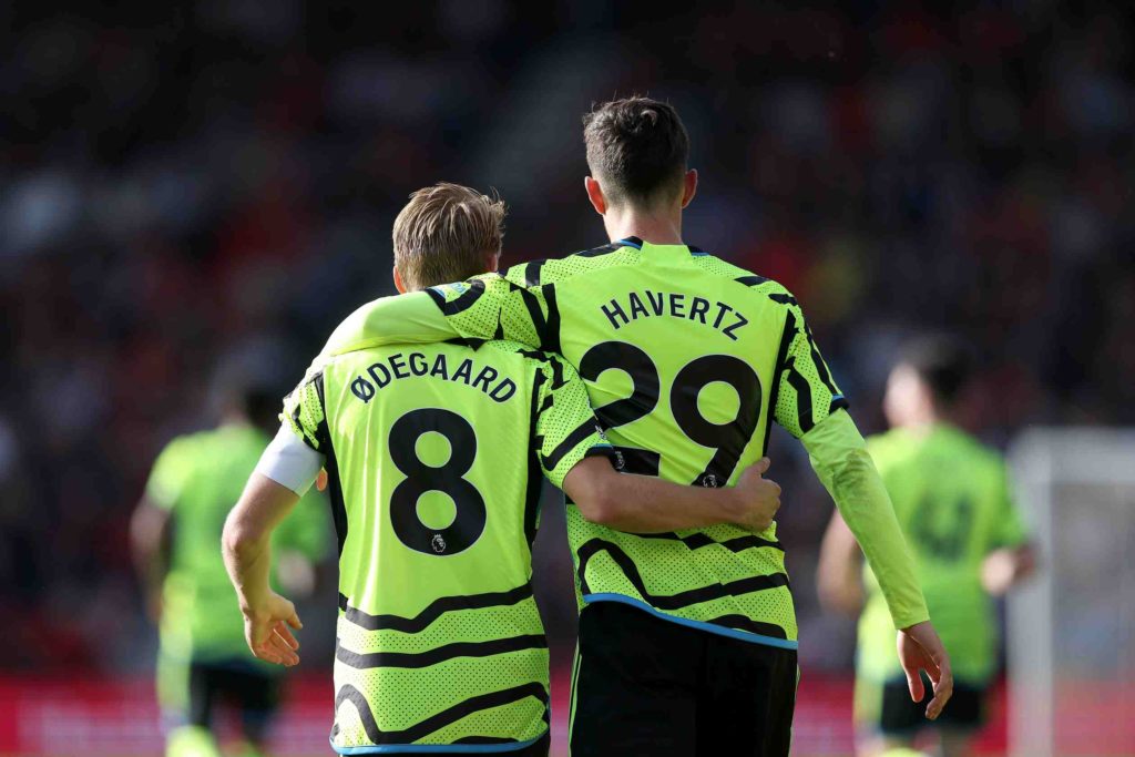 BOURNEMOUTH, ENGLAND - SEPTEMBER 30: Kai Havertz of Arsenal celebrates with teammate Martin Oedegaard after scoring the team's third goal from a penalty during the Premier League match between AFC Bournemouth and Arsenal FC at Vitality Stadium on September 30, 2023 in Bournemouth, England. (Photo by Christopher Lee/Getty Images)