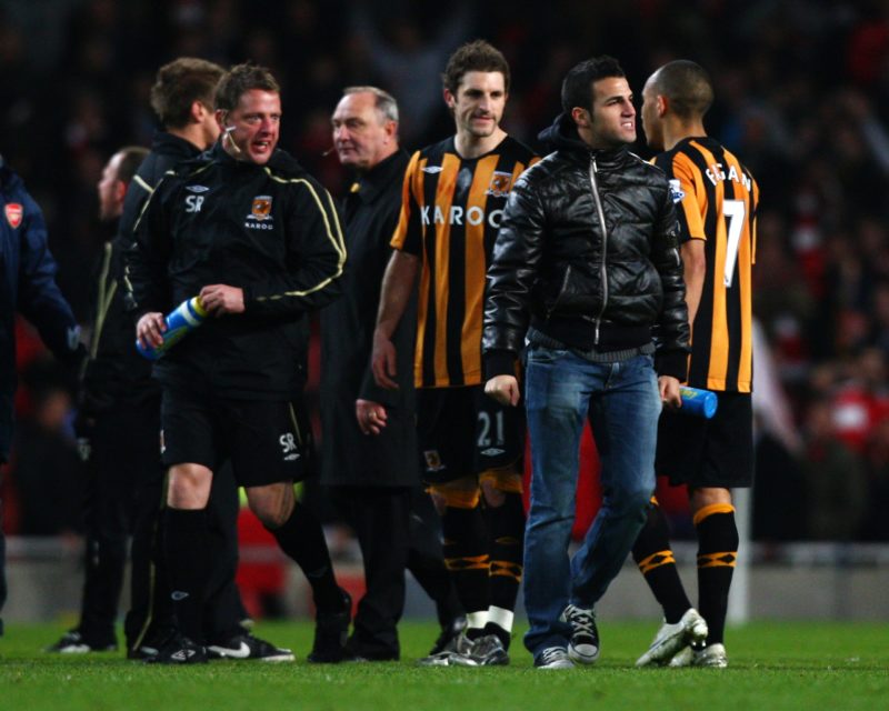 LONDON - MARCH 17: Brian Horton (3rd L), assistant manager of Hull, looks on as Cesc Fabregas comes onto the pitch after the the FA Cup Sponsored by E.on sixth round match between Arsenal and Hull City at Emirates Stadium on March 17, 2009 in London, England. (Photo by Ryan Pierse/Getty Images)