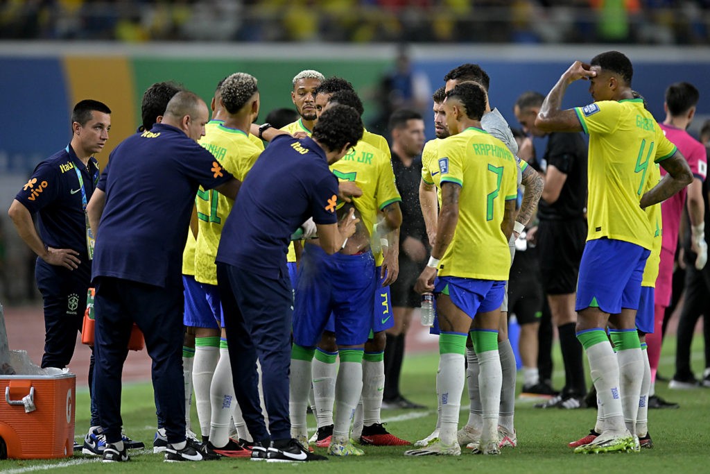 BELEM, BRAZIL: Neymar Jr. (C) of Brazil receives treatment during a FIFA World Cup 2026 Qualifier match between Brazil and Bolivia at Mangueirao on September 08, 2023. Arsenal's Gabriel Magalhaes stands off to the right-hand side (Photo by Pedro Vilela/Getty Images)