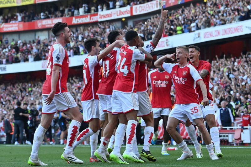 Arsenal's Brazilian striker #09 Gabriel Jesus celebrates with teammates after scoring their third goal during the English Premier League football match between Arsenal and Manchester United at the Emirates Stadium in London on September 3, 2023. (Photo by GLYN KIRK/AFP via Getty Images)