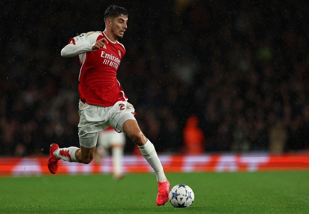 Arsenal's German midfielder Kai Havertz runs with the ball during the UEFA Champions League Group B football match between Arsenal and PSV Eindhoven at the Arsenal Stadium in north London on September 20, 2023. (Photo by ADRIAN DENNIS/AFP via Getty Images)
