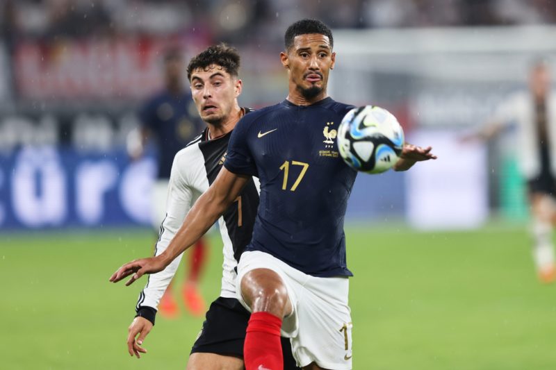 DORTMUND, GERMANY - SEPTEMBER 12: William Saliba of France is challenged by Kai Havertz of Germany during the International Friendly match between Germany and France at Signal Iduna Park on September 12, 2023 in Dortmund, Germany. (Photo by Christof Koepsel/Getty Images)