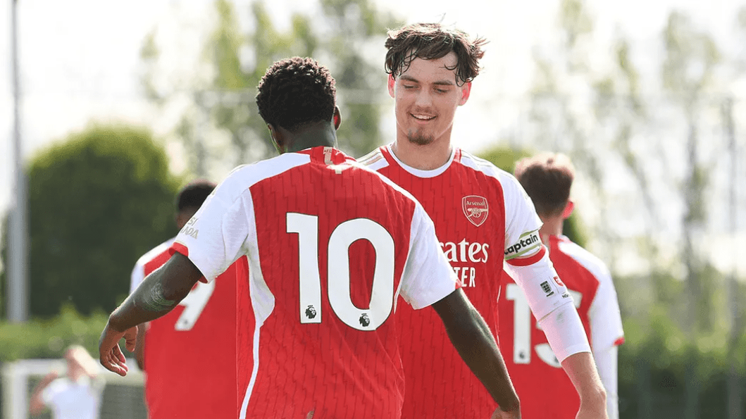 Michal Rosiak celebrates a goal for the Arsenal academy (Photo via Arsenal.com)