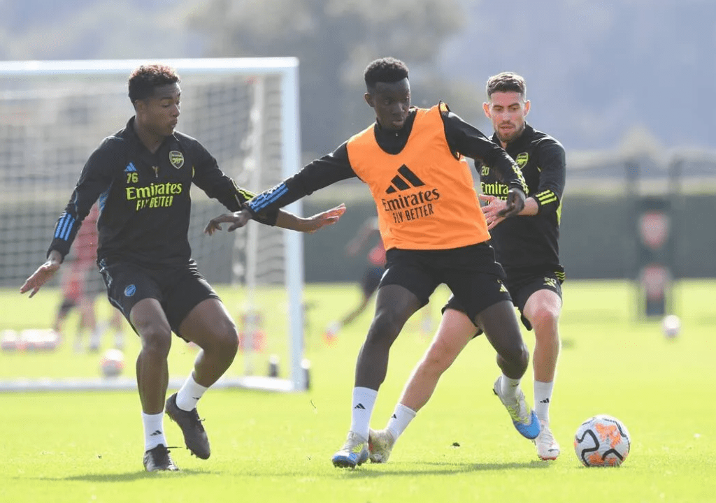 Reuell Walters (L) in first-team training with Arsenal (Photo via Arsenal.com)