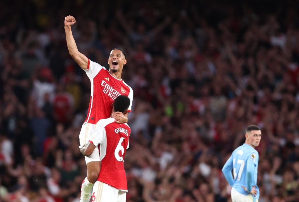 LONDON, ENGLAND - OCTOBER 08: William Saliba and Gabriel of Arsenal celebrate following their sides victory after the Premier League match between Arsenal FC and Manchester City at Emirates Stadium on October 08, 2023 in London, England. (Photo by Alex Pantling/Getty Images)