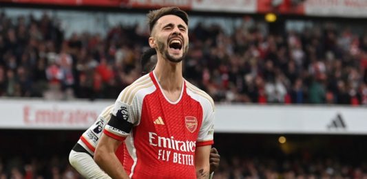 Arsenal's Fabio Vieira celebrates after scoring their fourth goal from the penalty spot during the English Premier League football match between Arsenal and Sheffield United at the Emirates Stadium in London on October 28, 2023. (Photo by GLYN KIRK/AFP via Getty Images)