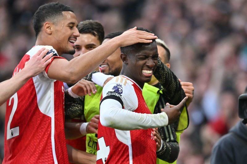 Arsenal's English striker #14 Eddie Nketiah (R) celebrates with teammates after scoring his, and their third goal during the English Premier League football match between Arsenal and Sheffield United at the Emirates Stadium in London on October 28, 2023. (Photo by GLYN KIRK/AFP via Getty Images)