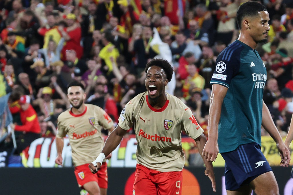 Lens' French forward #09 Elye Wahi celebrates after scoring his team's second goal during the UEFA Champions League Group B first leg football match between RC Lens and Arsenal FC at the Bollaert Stadium in Lens, northern France, on October 3, 2023. (Photo by DENIS CHARLET / AFP) (Photo by DENIS CHARLET/AFP via Getty Images)