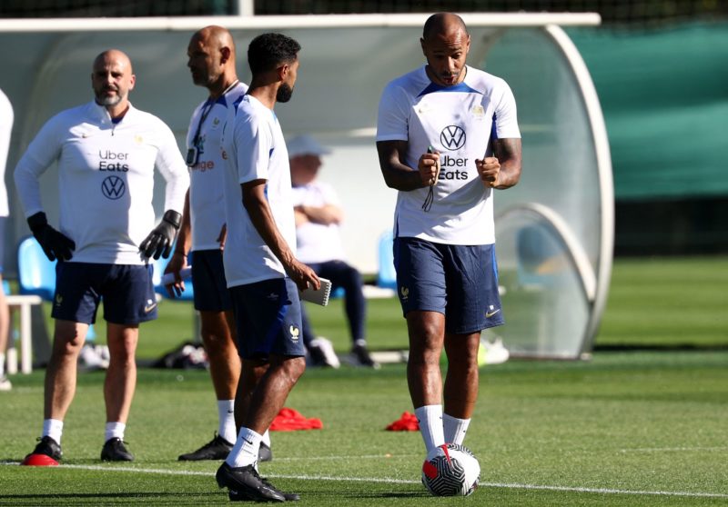 Former French football player and newly appointed France U21 head coach Thierry Henry (R) speaks with assistant coach Gael Clichy during a training session in Clairefontaine-en-Yvelines on September 4, 2023. (Photo by FRANCK FIFE/AFP via Getty Images)