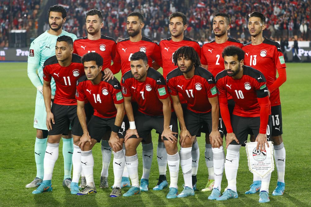 Egypt's starting eleven pose for a group photo before the start of the 2022 Qatar World Cup African Qualifiers football match between Egypt and Senegal at Cairo International Stadium in the Egyptian capital on March 25, 2022. (Photo by KHALED DESOUKI/AFP via Getty Images)