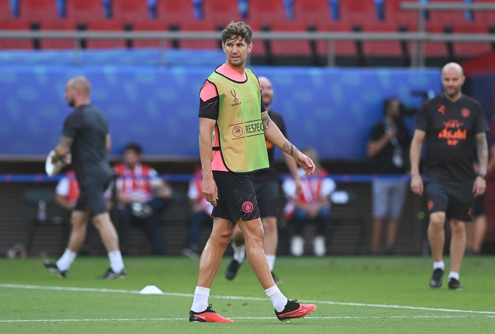 PIRAEUS, GREECE: John Stones of Manchester City looks on during a Manchester City Training Session ahead of the UEFA Super Cup 2023 match between Manchester City FC and Sevilla FC at Karaiskakis Stadium on August 15, 2023. (Photo by Claudio Villa/Getty Images)