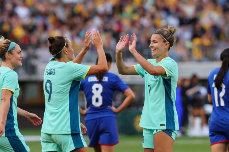PERTH, AUSTRALIA - OCTOBER 29: Steph Catley of the Matildas and Caitlin Foord of the Matildas celebrates a goal during the AFC Women's Asian Olympic Qualifier match between Philippines and Australia Matildas at Optus Stadium on October 29, 2023 in Perth, Australia. (Photo by James Worsfold/Getty Images)