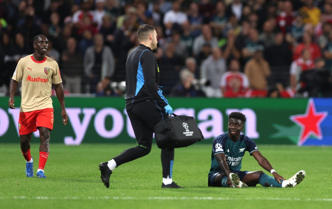 LENS, FRANCE - OCTOBER 03: Bukayo Saka of Arsenal reacts before being substituted during the UEFA Champions League match between RC Lens and Arsenal FC at Stade Bollaert-Delelis on October 03, 2023 in Lens, France. (Photo by Alex Pantling/Getty Images)