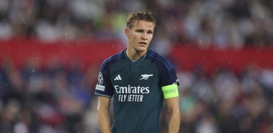 SEVILLE, SPAIN - OCTOBER 24: Martin Odegaard of Arsenal FC looks on during the UEFA Champions League match between Sevilla FC and Arsenal FC at Estadio Ramon Sanchez Pizjuan on October 24, 2023 in Seville, Spain. (Photo by Fran Santiago/Getty Images)