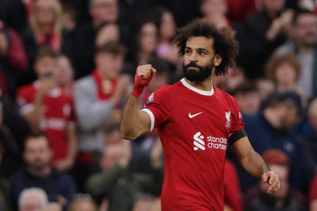 TOPSHOT - Liverpool's Egyptian striker #11 Mohamed Salah celebrates after scoring their third goal during the English Premier League football match between Liverpool and Nottingham Forest at Anfield in Liverpool, north west England on October 29, 2023. (Photo by IAN HODGSON/AFP via Getty Images)