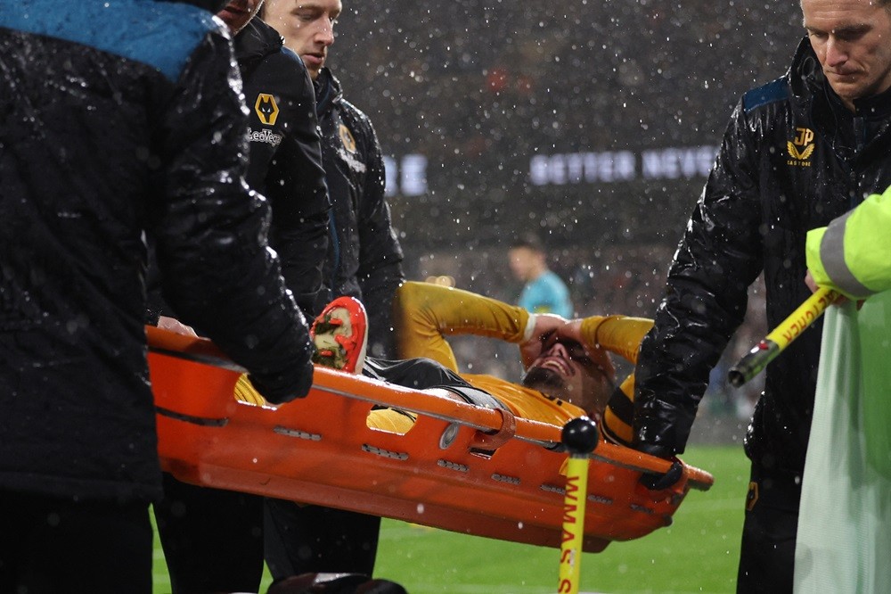 Wolverhampton Wanderers' Pedro Neto leaves the game on a stretcher after picking up an injury during the English Premier League football match between Wolverhampton Wanderers and Newcastle United at the Molineux stadium in Wolverhampton, central England on October 28, 2023. (Photo by ADRIAN DENNIS/AFP via Getty Images)