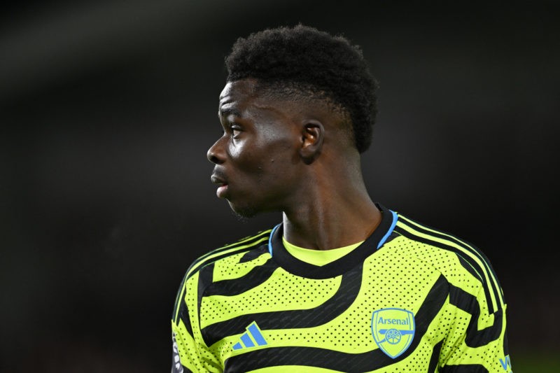 BRENTFORD, ENGLAND - NOVEMBER 25: Bukayo Saka of Arsenal looks on during the Premier League match between Brentford FC and Arsenal FC at Gtech Community Stadium on November 25, 2023 in Brentford, England. (Photo by Mike Hewitt/Getty Images)