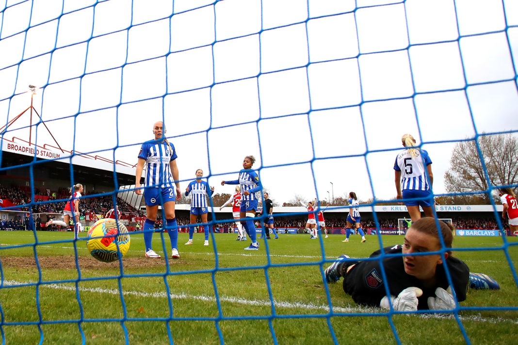 CRAWLEY, ENGLAND - NOVEMBER 19: Sophie Baggaley of Brighton & Hove Albion and teammates look dejected after failing to save the goal scored by Stina Blackstenius of Arsenal during the Barclays Women´s Super League match between Brighton & Hove Albion and Arsenal FC at Broadfield Stadium on November 19, 2023 in Crawley, England. (Photo by Bryn Lennon/Getty Images)