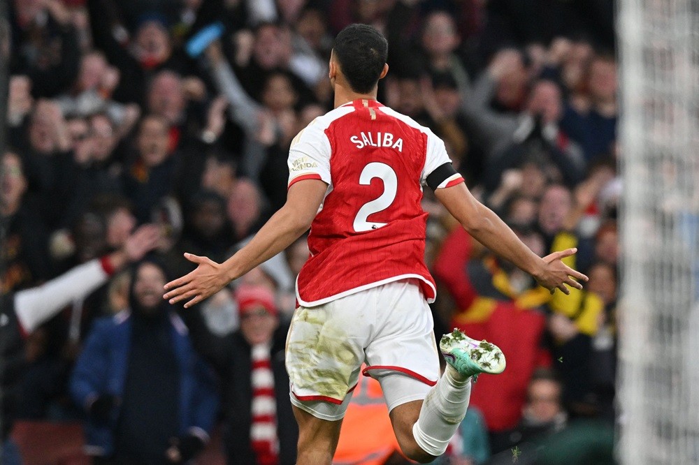 Arsenal's William Saliba celebrates after scoring their second goal during the English Premier League football match between Arsenal and Burnley at the Emirates Stadium in London on November 11, 2023. (Photo by GLYN KIRK/AFP via Getty Images)