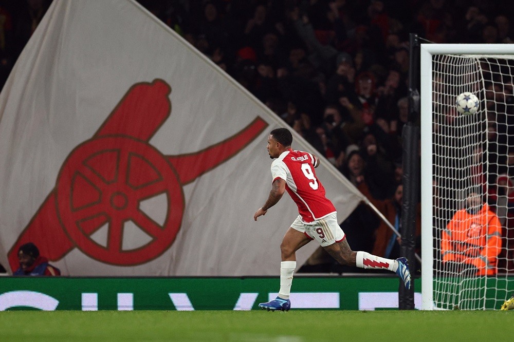 Arsenal's Gabriel Jesus (L) celebrates scoring his team's second goal during the UEFA Champions League Group B football match between Arsenal and RC Lens at the Arsenal Stadium in north London on November 29, 2023. (Photo by ADRIAN DENNIS/AFP via Getty Images)