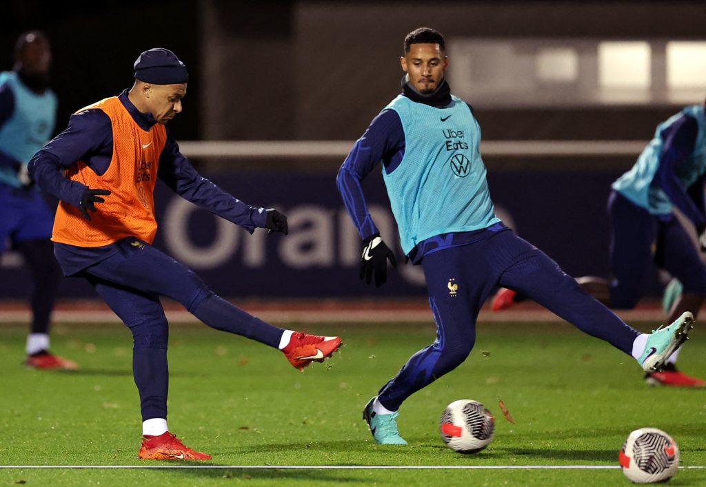 France's forward Kylian Mbappe (L) fights for the ball with France's defender WIlliam Saliba (R) during a training session in Clairefontaine-en-Yvelines, on November 14, 2023, as part of the team's preparation for upcoming UEFA Euro 2024 football tournament qualifying matches. (Photo by FRANCK FIFE/AFP via Getty Images)