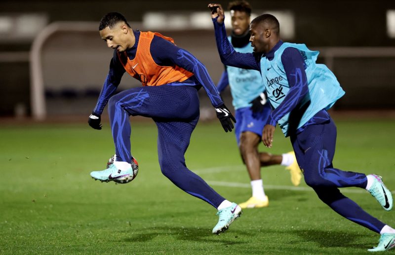 France's defender William Saliba (L) controls the ball during a training session in Clairefontaine-en-Yvelines on November 15, 2023 as part of the team's preparation for upcoming UEFA Euro 2024 football tournament qualifying matches. (Photo by FRANCK FIFE/AFP via Getty Images)