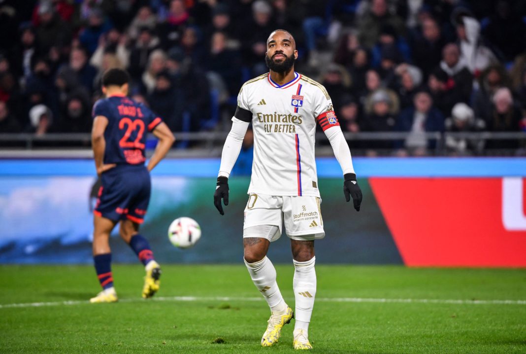 Lyon's French forward #10 Alexandre Lacazette reacts after missing a goal opportunity during the French L1 football match between Olympique Lyonnais (Lyon) and LOSC (Lille) at the Groupama stadium in Lyon, central eastern France on November 26, 2023. (Photo by ARNAUD FINISTRE/AFP via Getty Images)