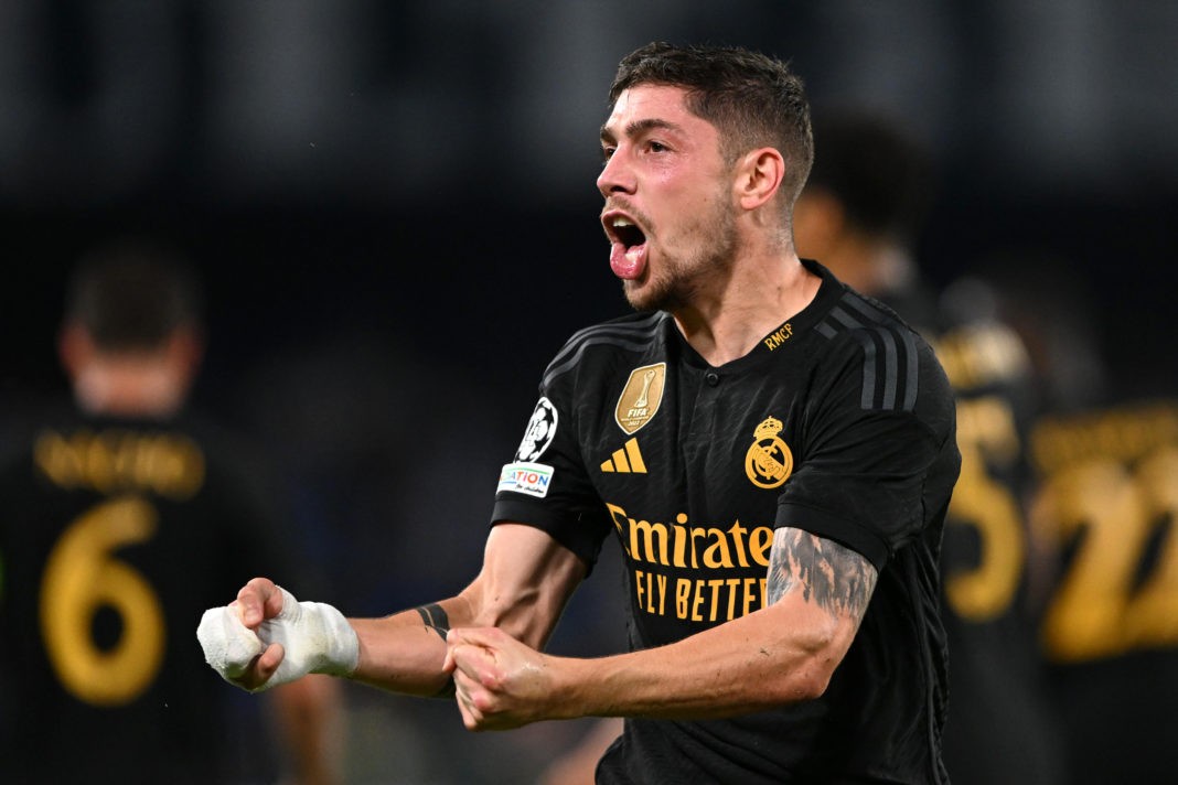 NAPLES, ITALY - OCTOBER 03: Federico Valverde of Real Madrid celebrates after Alex Meret of Napoli (not pictured) scores an own goal and Real Madrid's third goal during the UEFA Champions League match between SSC Napoli and Real Madrid CF at Stadio Diego Armando Maradona on October 03, 2023 in Naples, Italy. (Photo by Francesco Pecoraro/Getty Images)