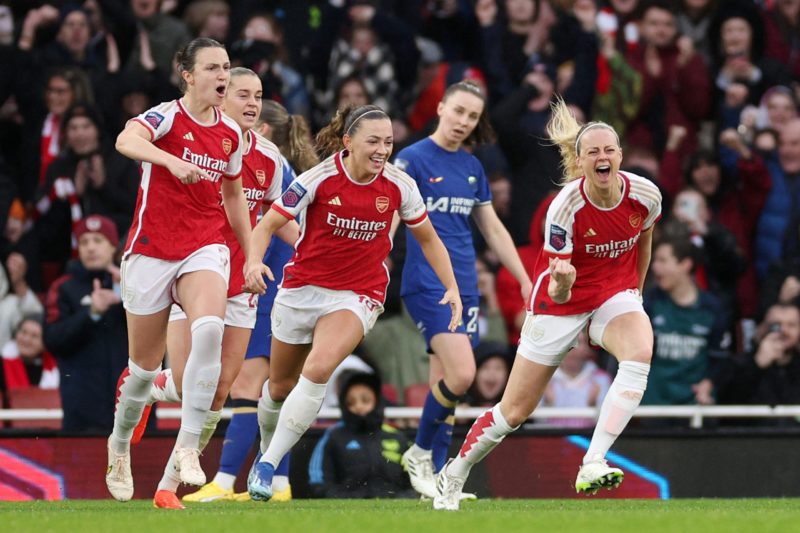 LONDON, ENGLAND - DECEMBER 10: Alessia Russo of Arsenal (obscured) celebrates with teammates after scoring their team's third goal during the Barclays Women's Super League match between Arsenal FC and Chelsea FC at Emirates Stadium on December 10, 2023 in London, England. (Photo by Warren Little/Getty Images)