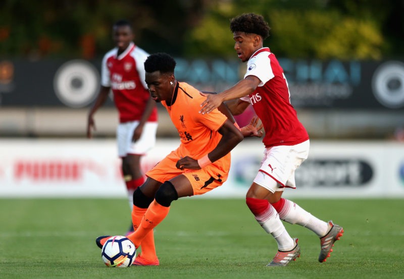 BOREHAMWOOD, ENGLAND - AUGUST 25: Ovie Ejaria of Liverpool and Reiss Nelson of Arsenal in action during the Premier League 2 match between Arsenal and Liverpool at Meadow Park on August 25, 2017 in Borehamwood, England. (Photo by Alex Pantling/Getty Images)