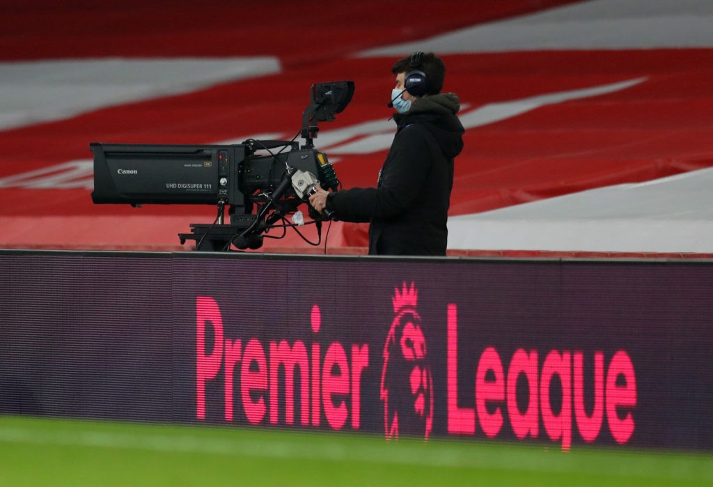 LONDON, ENGLAND - NOVEMBER 29: A television camera behind the Premier League logo during the Premier League match between Arsenal and Wolverhampton Wanderers at Emirates Stadium on November 29, 2020 in London, England. Sporting stadiums around the UK remain under strict restrictions due to the Coronavirus Pandemic as Government social distancing laws prohibit fans inside venues resulting in games being played behind closed doors. (Photo by Catherine Ivill/Getty Images)