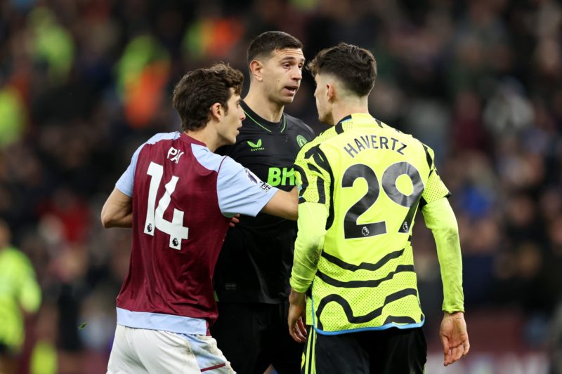 BIRMINGHAM, ENGLAND - DECEMBER 09: Kai Havertz of Arsenal clashes with Emiliano Martinez of Aston Villa during the Premier League match between Aston Villa and Arsenal FC at Villa Park on December 09, 2023 in Birmingham, England. (Photo by Catherine Ivill/Getty Images)