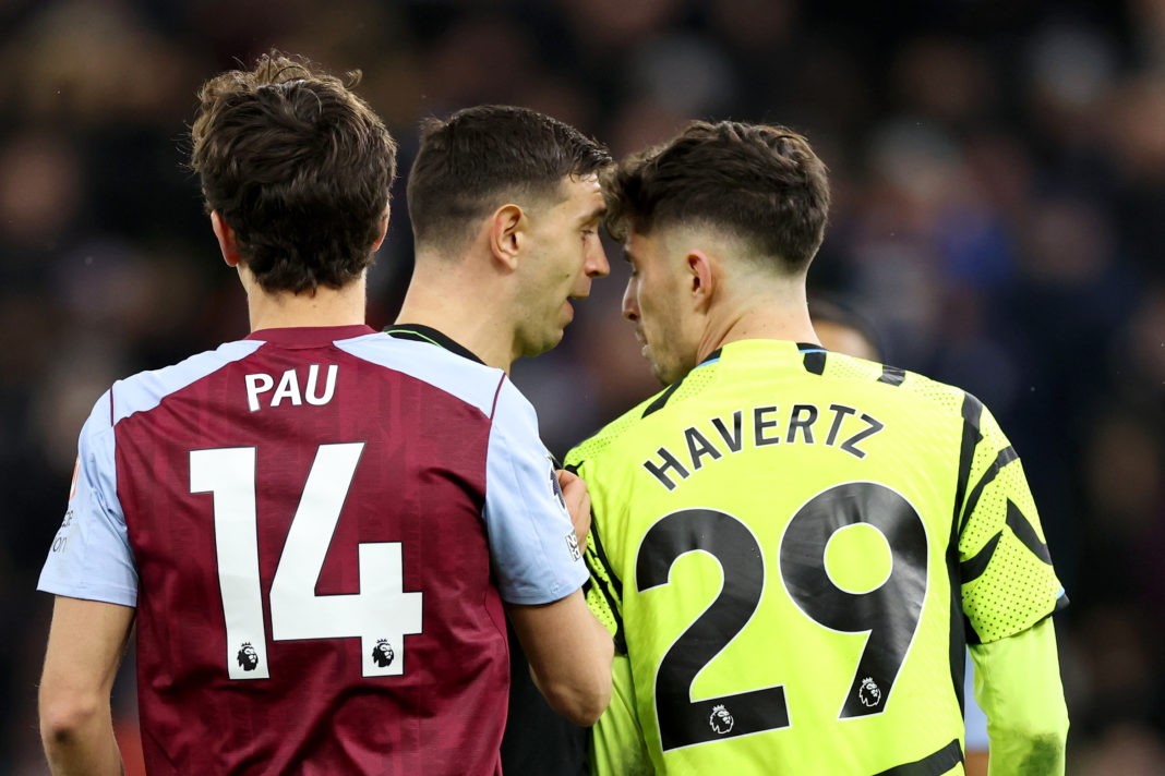 BIRMINGHAM, ENGLAND - DECEMBER 09: Kai Havertz of Arsenal clashes with Emiliano Martinez of Aston Villa during the Premier League match between Aston Villa and Arsenal FC at Villa Park on December 09, 2023 in Birmingham, England. (Photo by Catherine Ivill/Getty Images)