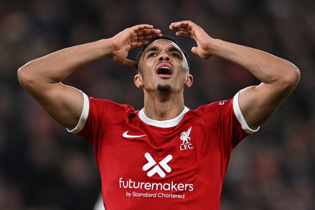 Liverpool's English defender #66 Trent Alexander-Arnold reacts after failing to score during the English Premier League football match between Liverpool and Manchester United at Anfield in Liverpool, north west England on December 17, 2023. (Photo by PAUL ELLIS/AFP via Getty Images)