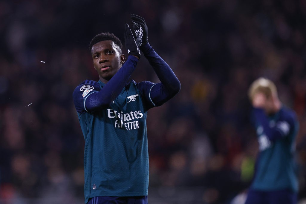Arsenal's British forward #14 Eddie Nketiah aknowledges the supporters at the end of a UEFA Champions League group B football match between PSV Eindhoven and Arsenal FC at the Philips Stadium in Eindhoven, on December 12, 2023. (Photo by KENZO TRIBOUILLARD/AFP via Getty Images)