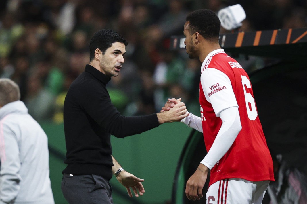 Arsenal's Spanish manager Mikel Arteta (L) shakes hands with Arsenal's Brazilian defender Gabriel Magalhaes during the UEFA Europa League last 16 first leg football match between Sporting CP and Arsenal at Jose Alvalade stadium in Lisbon on March 9, 2023. (Photo by FILIPE AMORIM/AFP via Getty Images)