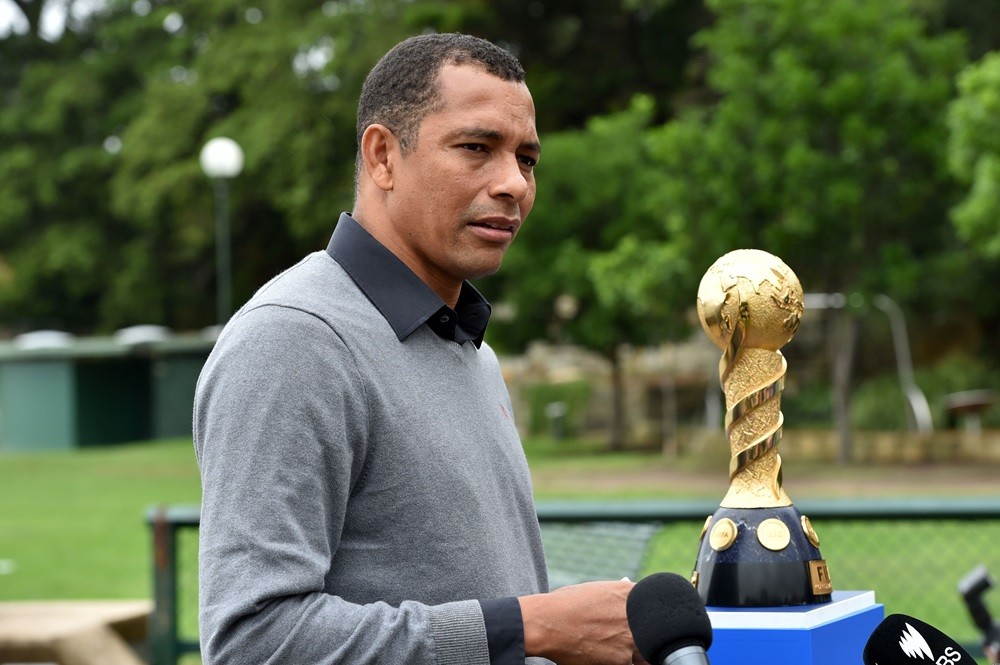 Former Brazilian football player Gilberto Silva talks to the media after posing for photos with the 2017 FIFA Confederations Cup at Blues Point Reserve in Sydney on March 17, 2017. (Photo: SAEED KHAN/AFP via Getty Images)