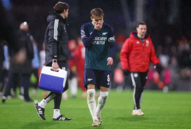 LONDON, ENGLAND - DECEMBER 31: Martin Odegaard of Arsenal looks dejected after the team's defeat in the Premier League match between Fulham FC and Arsenal FC at Craven Cottage on December 31, 2023 in London, England. (Photo by Clive Rose/Getty Images)