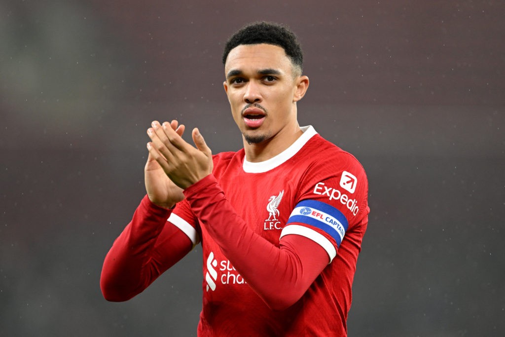 LIVERPOOL, ENGLAND - DECEMBER 20: Trent Alexander-Arnold of Liverpool applauds the fans during the Carabao Cup Quarter Final match between Liverpool and West Ham United at Anfield on December 20, 2023 in Liverpool, England. (Photo by Michael Regan/Getty Images)