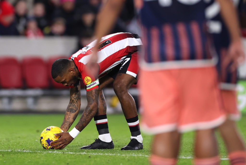 BRENTFORD, ENGLAND - JANUARY 20: Ivan Toney of Brentford moves the ball before taking and scoring a free-kick for his sides first goal during the Premier League match between Brentford FC and Nottingham Forest at Gtech Community Stadium on January 20, 2024 in Brentford, England. (Photo by Alex Pantling/Getty Images)
