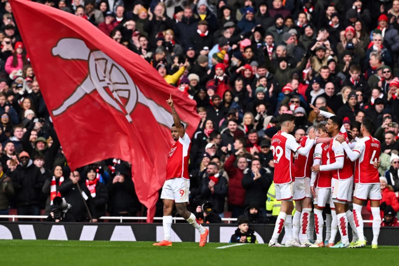 Arsenal's Belgian midfielder #19 Leandro Trossard (R-C) celebrates with teammates after scoring his team third goal during the English Premier League football match between Arsenal and Crystal Palace at the Emirates Stadium in London on January 20, 2024. (Photo by BEN STANSALL/AFP via Getty Images)