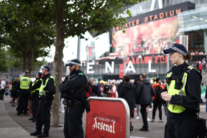 Police officers patrol outside the ground ahead of the English Premier League football match between Arsenal and Tottenham Hotspur at the Emirates Stadium in London on September 24, 2023. (Photo by HENRY NICHOLLS/AFP via Getty Images)