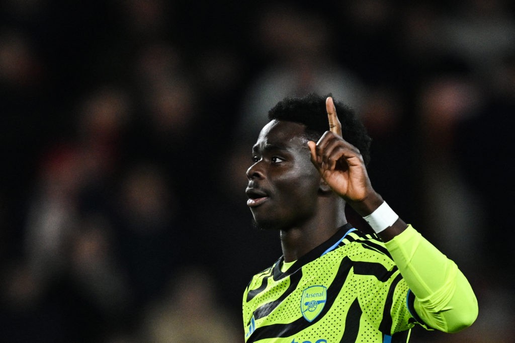 Arsenal's English midfielder #07 Bukayo Saka celebrates scoring his team second goal during the English Premier League football match between Nottingham Forest and Arsenal at The City Ground in Nottingham, central England, on January 30, 2024. (Photo by PAUL ELLIS/AFP via Getty Images)