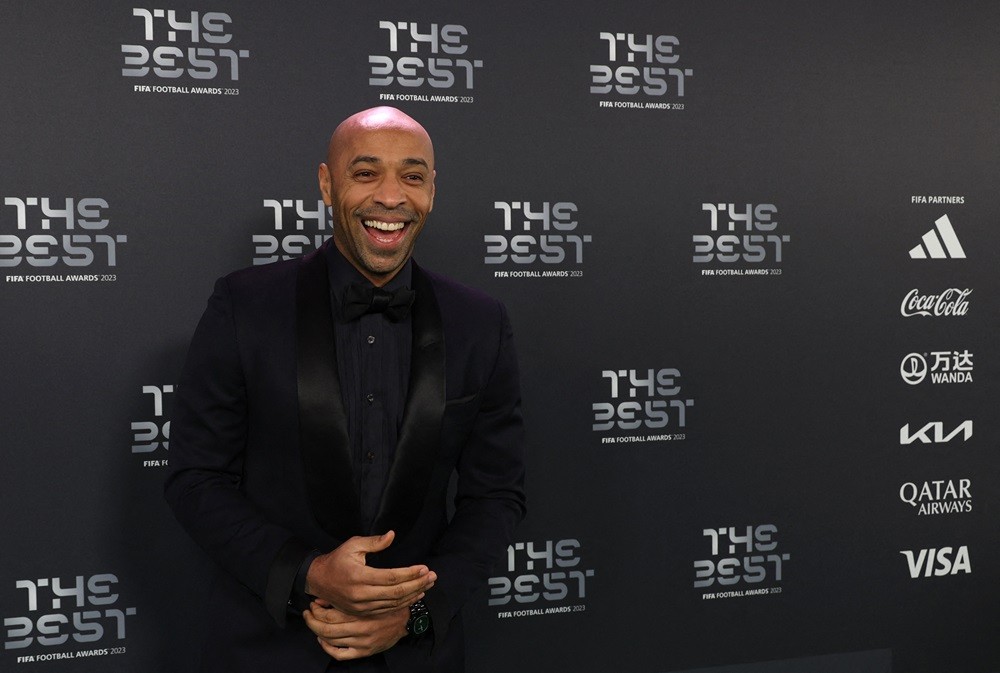 Former France International Thierry Henry smiles upon arrival to attend the Best FIFA Football Awards 2023 ceremony in London on January 15, 2024. (Photo by ADRIAN DENNIS/AFP via Getty Images)
