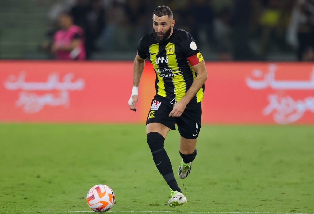 Ittihad's French forward #09 Karim Benzema runs with the ball during the Saudi Pro League football match between Al-Ittihad and Al-Nassr at King Abdullah Sports City Stadium in Jeddah on December 26, 2023. (Photo by -/AFP via Getty Images)